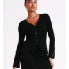 Basque Variegated Rib Fluted Sleeve Knit In Black